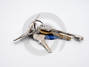 A bunch of keys on a white background