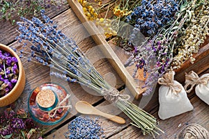 Bunch of lavender and medicinal herbs, mortar of dry flowers.