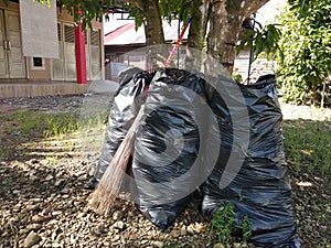 A bunch of leaf litter in a trash bag