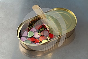 A bunch of little hearts in a tin