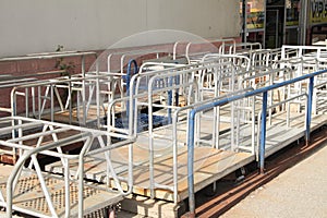 a bunch lot of flatbed dollies shopping hardware carts bunched parked together. p