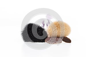 Bunch of make-up brushes - Cosmetics and beauty. Make-up brushes set in row on white  background