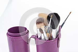 Bunch of make-up brushes - Cosmetics and beauty.Make-up brushes set in row on white background