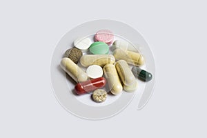 A bunch of medicines  on white background, different pills.