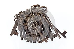 Bunch of old keys isolated on white background