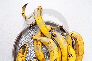 Bunch of overripe bananas for baking banana bread, closeup view shot directly above