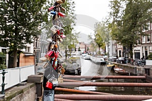Bunch of padlocks on a bridge in Amsterdam