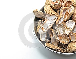 A bunch of Peanut shells on a white background