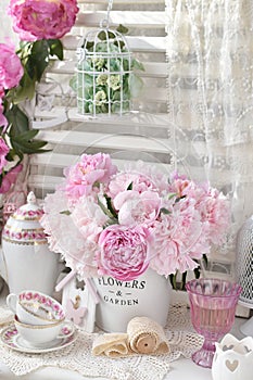 Bunch of peony in shabby chic style interior