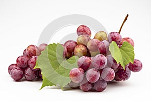 A bunch of  pink grapes close-up isolated on a white background