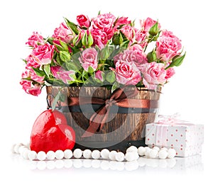 Bunch pink roses with gift to day saint valentine