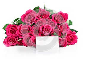 Bunch of pink roses and a greeting card