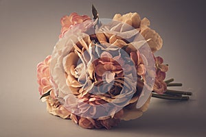 Bunch of plastic flowers in vintage style