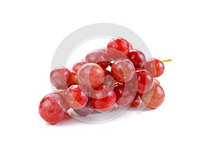 Bunch of red grapes , fresh with water drops. on white