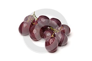 Bunch of red grapes isolated on white background