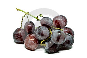 Bunch of red grapes isolated on white background