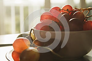 Bunch of red grapes in the kitchen