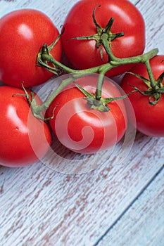 A bunch of red greenhouse tomatoes from Quebec