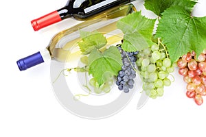 Bunch of red, purple and white grapes and wine