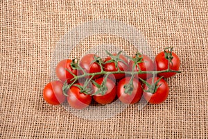 Bunch of red ripe tasty fresh cherry tomatos