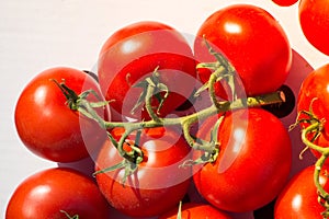 Bunch of red ripe tasty fresh cherry tomatos