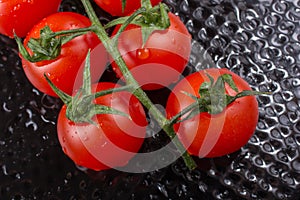 Bunch of red ripe tasty fresh cherry tomatos