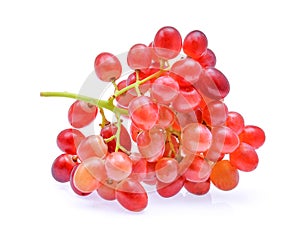 Bunch red seedless crimson grape isolated on white