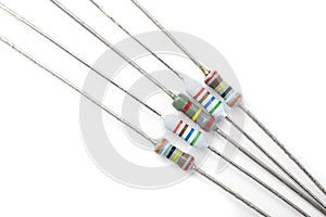 Bunch of resistors, electronic components, on a white background.