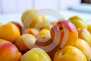 A bunch of Ripe and fresh apricots close-up. Great texture.