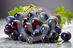 bunch of ripe red grapes with leaves