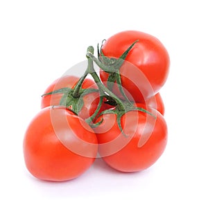 Bunch of ripe red tomato isolated on white background. Five juicy tomatoes. Close up. Twig.