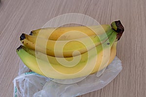 Bunch of Ripe Yellow Bananas Just taken out of the Grocery Bag
