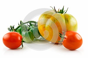 Bunch of Ripe Yellow, Red, Green Tomatoes Isolated