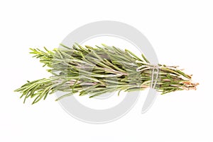 Bunch of rosemary tied up twine on a white background