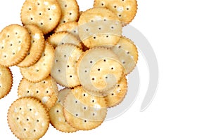 A bunch of round salted crackers