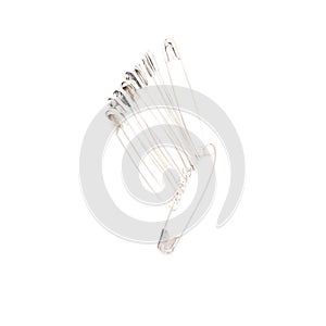 Bunch of safety pins isolated on white background