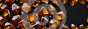 bunch of shiny amber gemstone plain black dark background panoramic wide angle ai generated