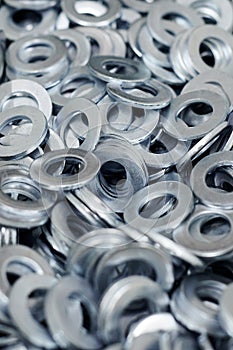 Bunch of stainless steel galvanized flat washers for fastener screws, nuts or bolts