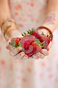 Bunch , strawberries and woman hands as a vegetarian for healthy, organic and balanced diet by eating nutritious snacks