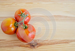 Bunch of three tomatoes