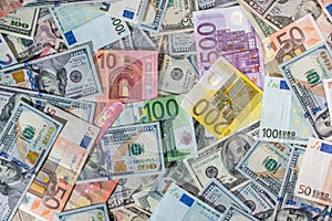 A bunch of two leading currencies - the US dollar and euro banknotes