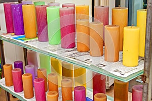 A bunch of unburnt colorful candles photo