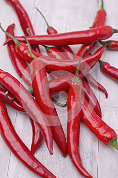 Bunch of red Chilli Peppers in white background