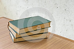 Bunch of vintage books on wooden table