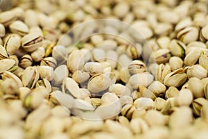 Bunch of white pistachios in supermarket. Healthful uncooked nuts in grocery. Superfood, healthy eating, assortment.