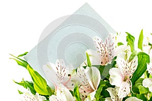 Bunch of white tiger lilies with a blank card