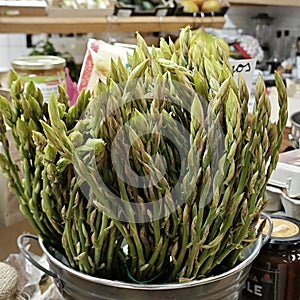 bunch of wild asparagus in a market store