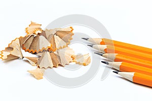 Bunch of yellow pencils with shawings and pencil sharpeners isolated on white - Image