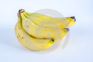 Bunch of yellow ripe bananas isolated on white background