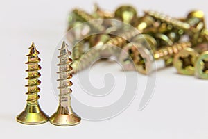 Bunch of yellow zinc coated philips flat head cross screws - fasteners